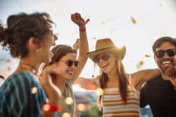 Friends hanging out at a festival.